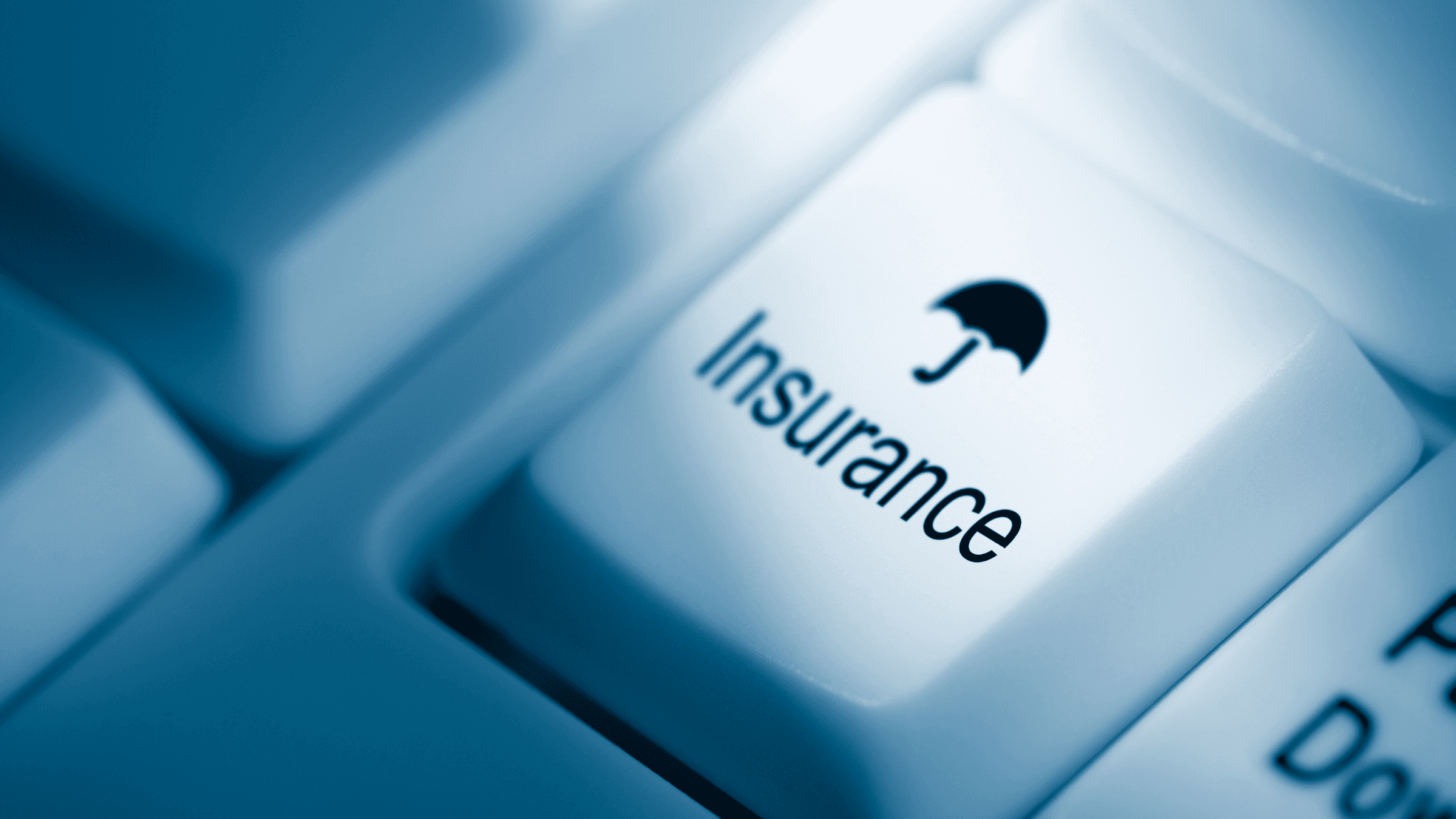 Insurance key on a computer keyboard